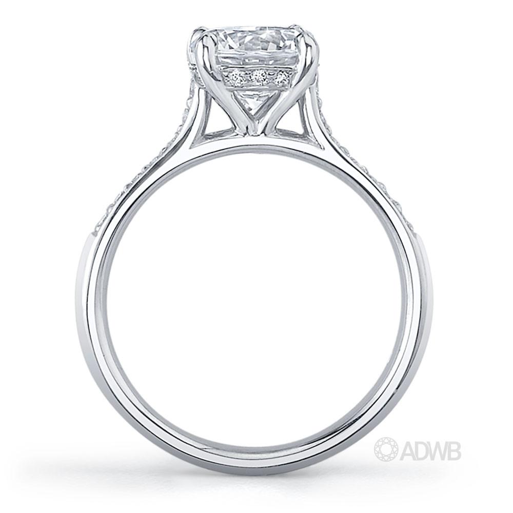 Caroline 4 claw round brilliant cut diamond solitaire ring with grain set diamonds in the band