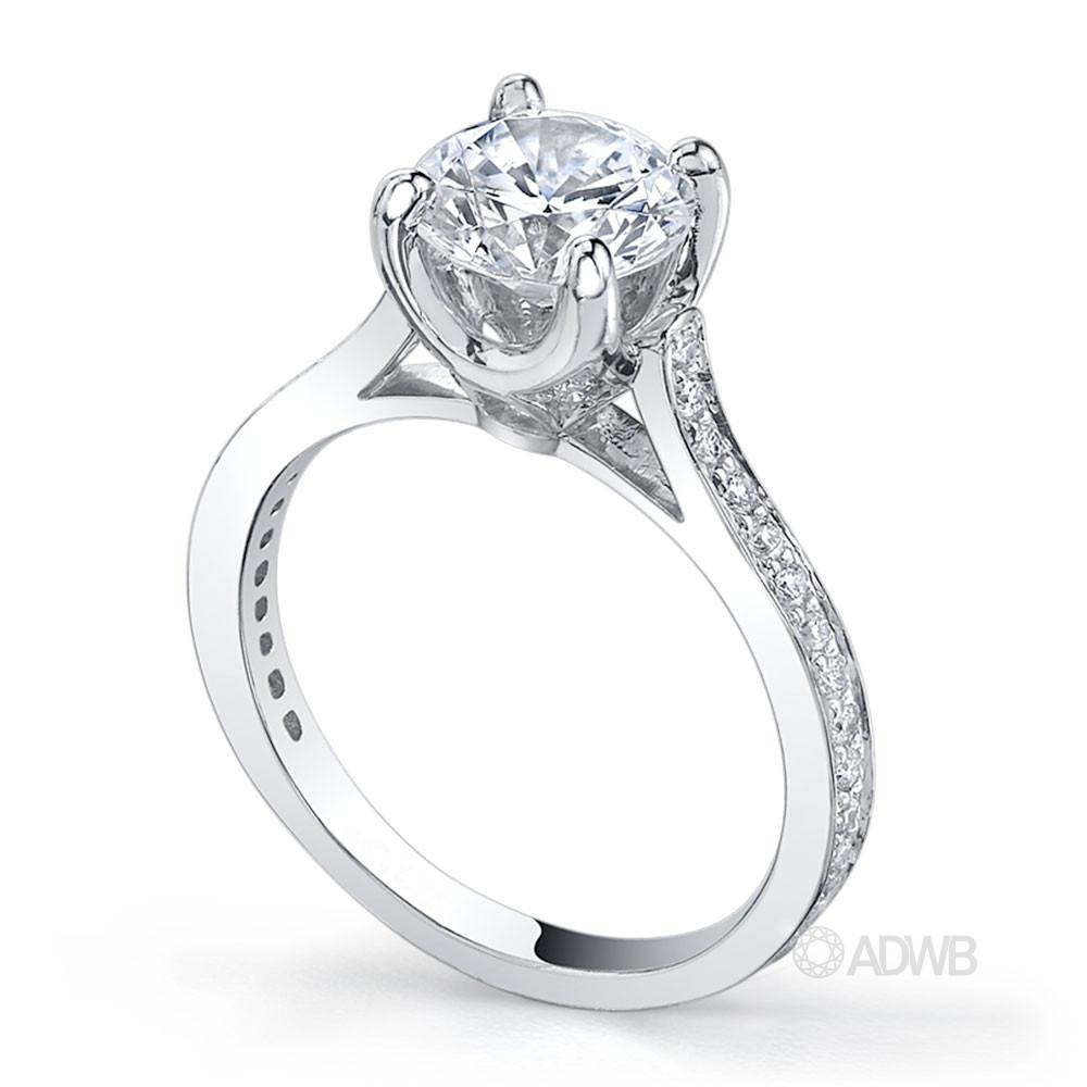 Grace 4 claw round brilliant cut diamond solitaire ring with grain set side diamonds