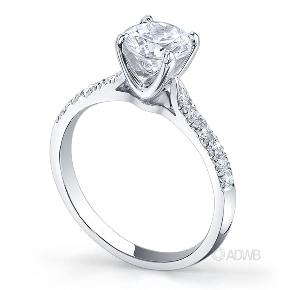 Grace 4 claw round brilliant cut diamond solitaire ring with french pave set band