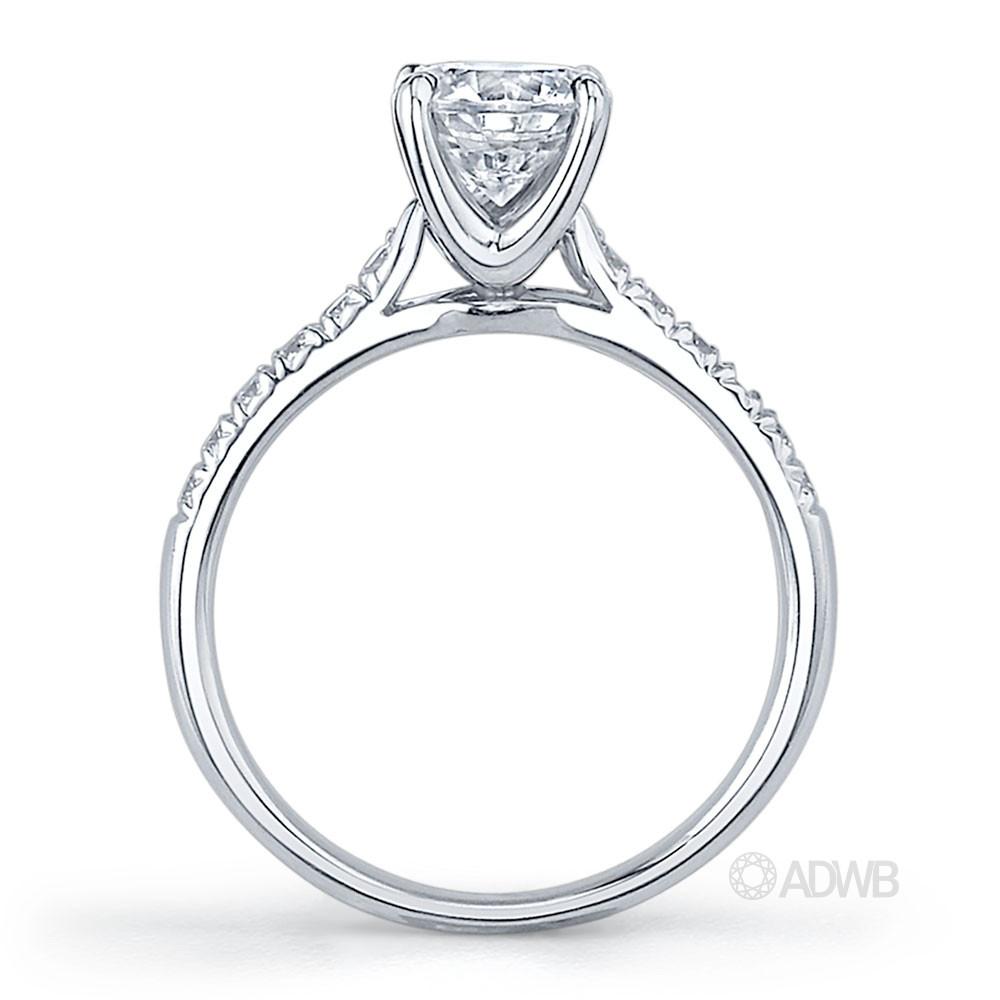 Grace 4 claw round brilliant cut diamond solitaire ring with french pave set band