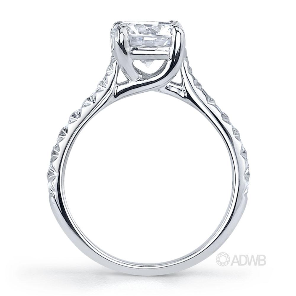 Star 4 claw round brilliant cut diamond solitaire ring with micro pave set band