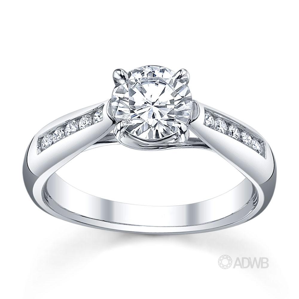 Australian Diamond Broker - Star 4 claw round brilliant cut diamond solitaire ring with channel set tapered band