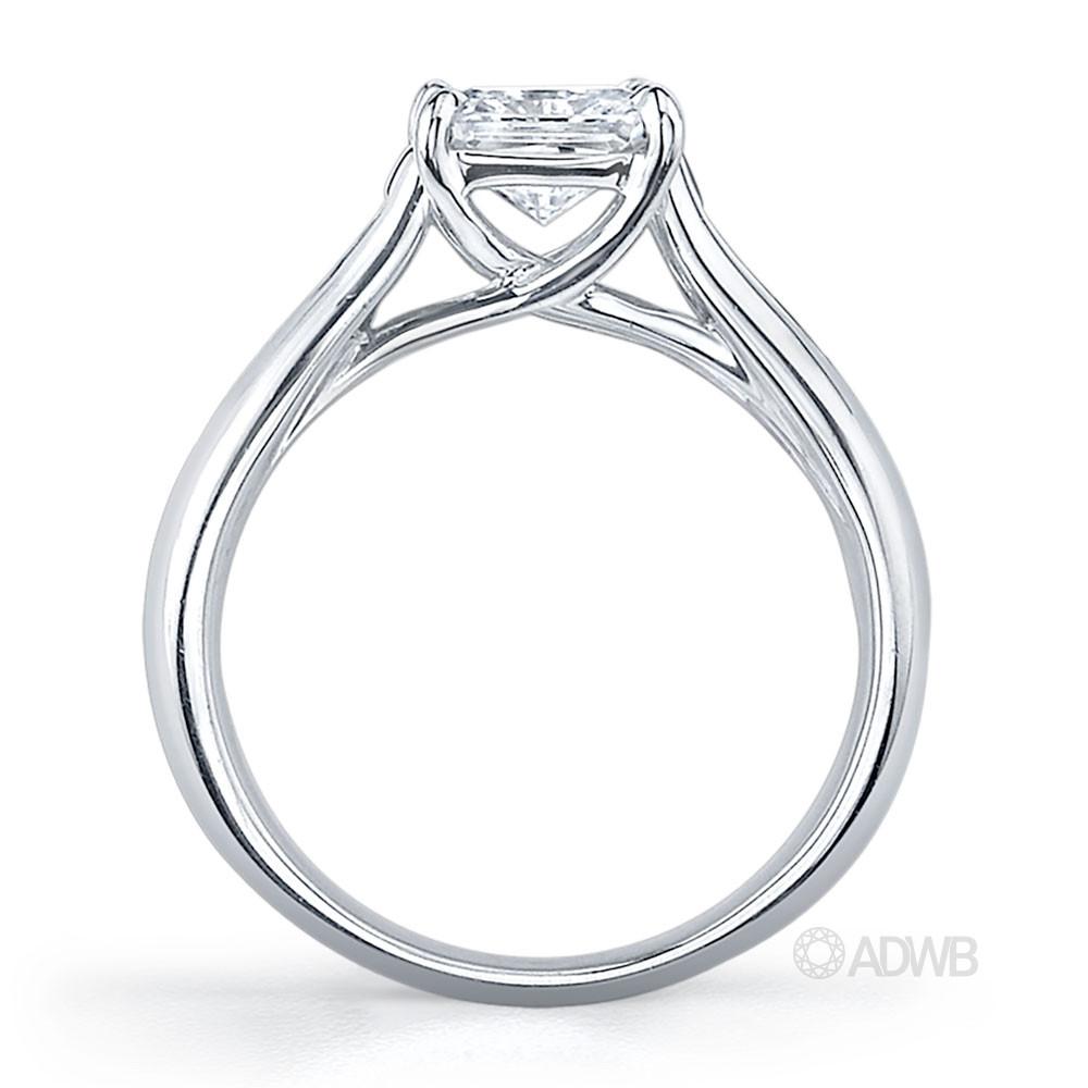 Cross prong princess cut ring with channel set princess cut side diamonds tapered out band