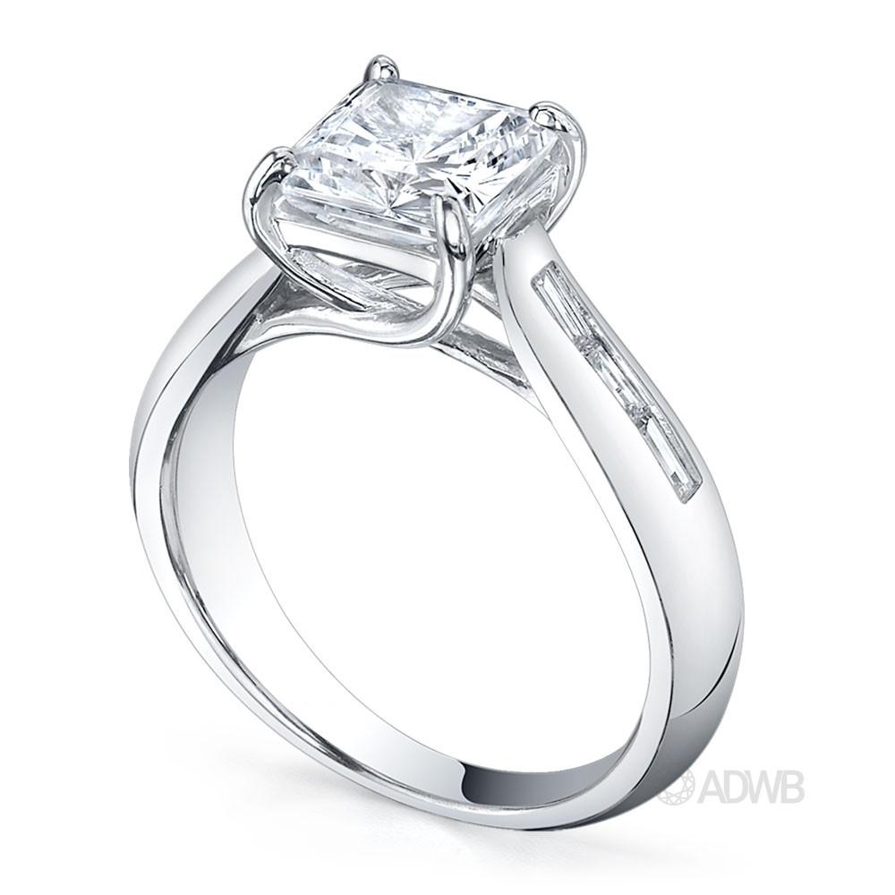 Cross prong princess cut ring with channel set baguette diamonds