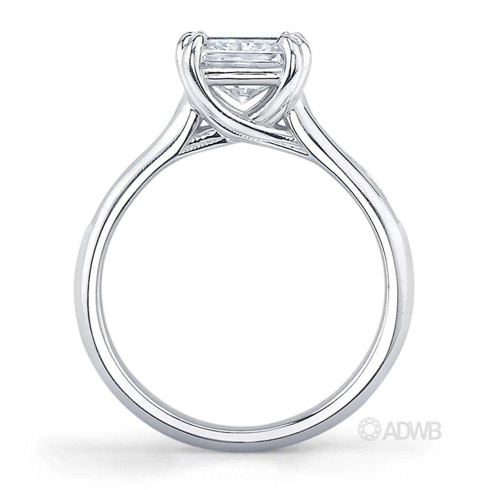 Cross double prong princess cut ring with channel set princess cut side diamonds