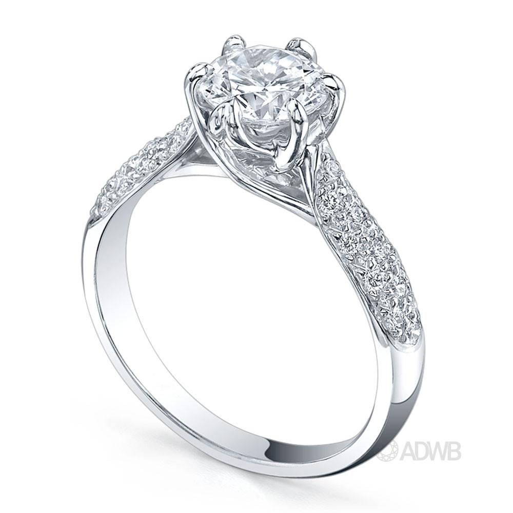 Royal crown round brilliant cut diamond ring with pave set band