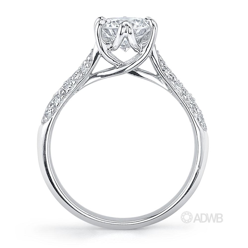 Royal crown round brilliant cut diamond ring with pave set band