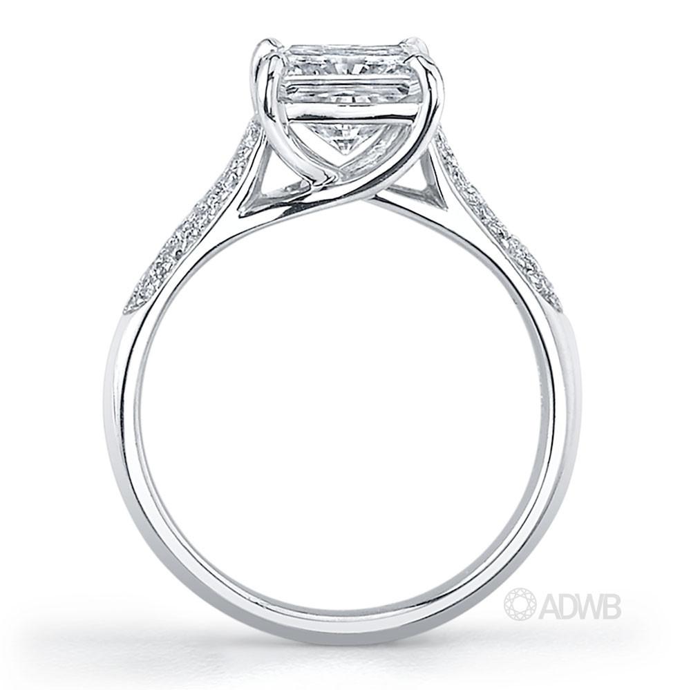 Cross claw princess cut ring with round brilliant cut diamonds pave set band