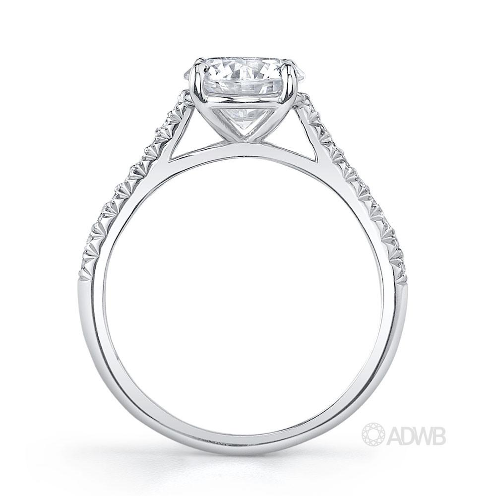Traditional round brilliant cut diamond ring with micro pave set diamond band