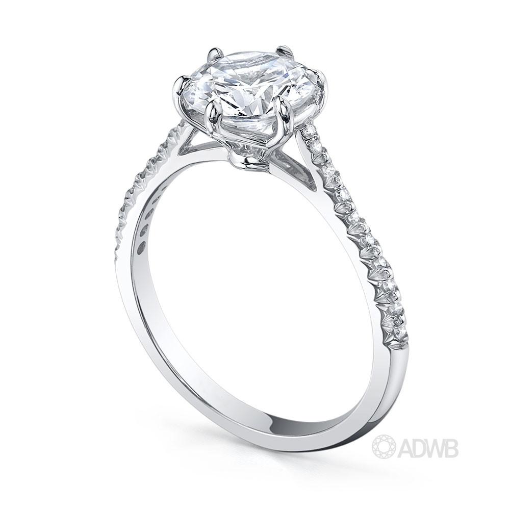 Classic 6 claw round brilliant cut diamond ring with french pave set diamond band