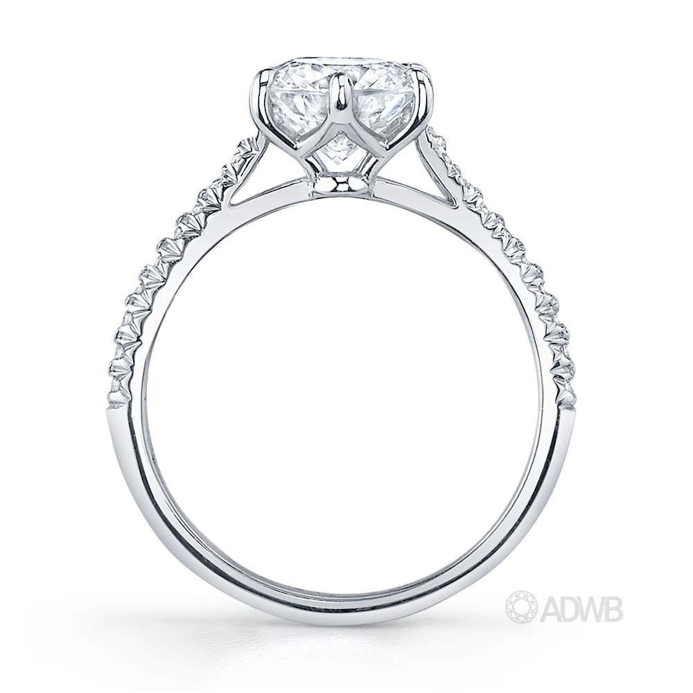 Classic 6 claw round brilliant cut diamond ring with french pave set diamond band