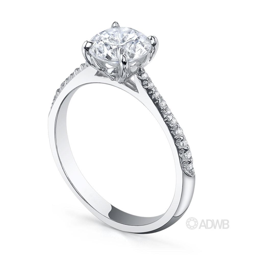 Emily round brilliant cut diamond solitaire ring with micro pave set diamond band