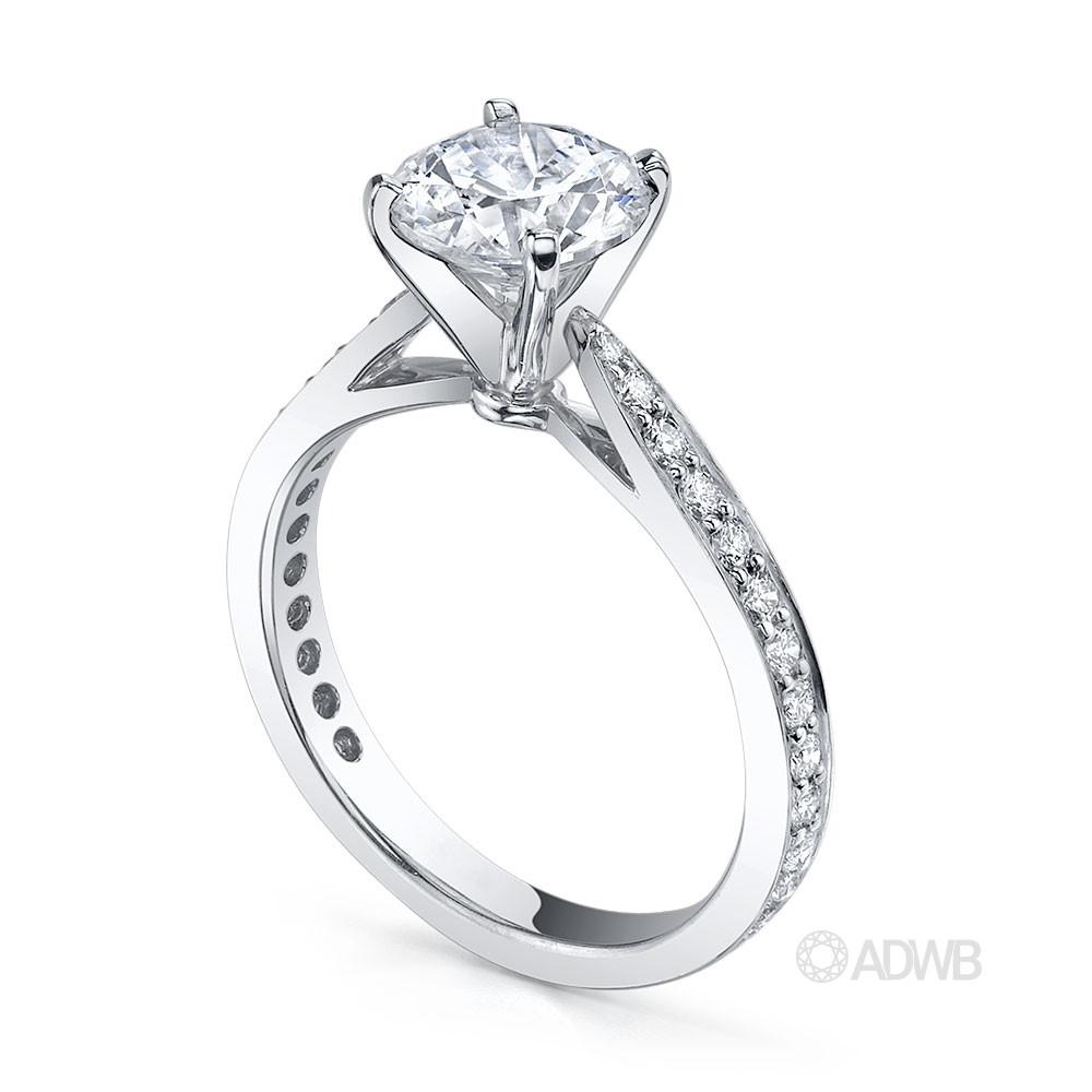 New York 4 claw round brilliant cut diamond solitaire ring with grain set diamond band