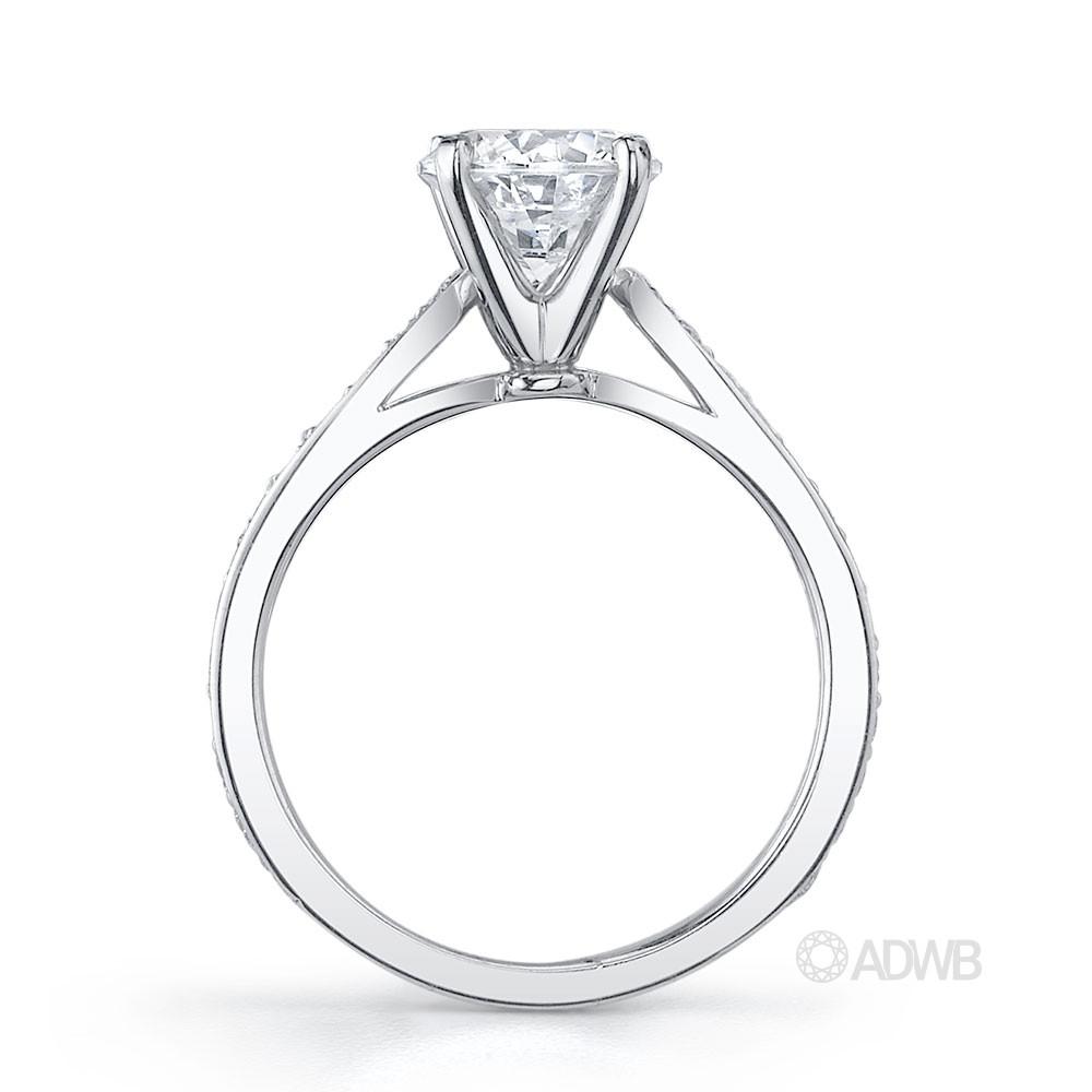 New York 4 claw round brilliant cut diamond solitaire ring with grain set diamond band