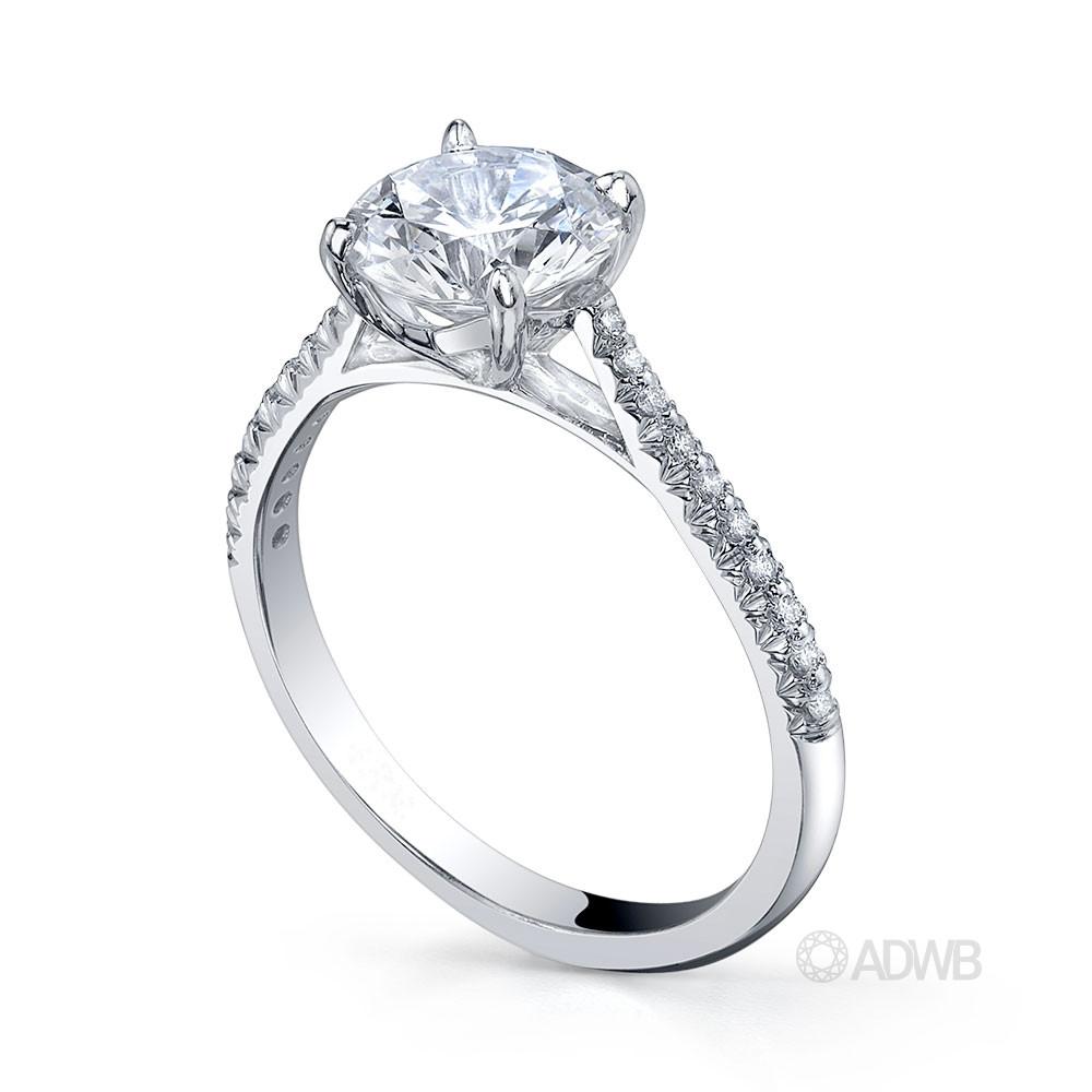 Coco 4 claw round brilliant cut diamond solitaire ring with pave set diamond band