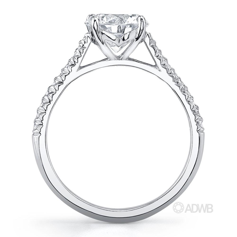 Coco 4 claw round brilliant cut diamond solitaire ring with pave set diamond band