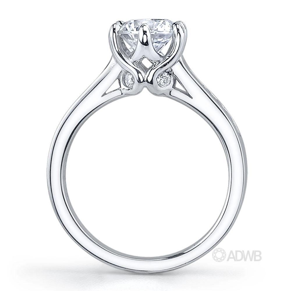 Elegant 6 claw round brilliant cut diamond solitaire ring with channel set band