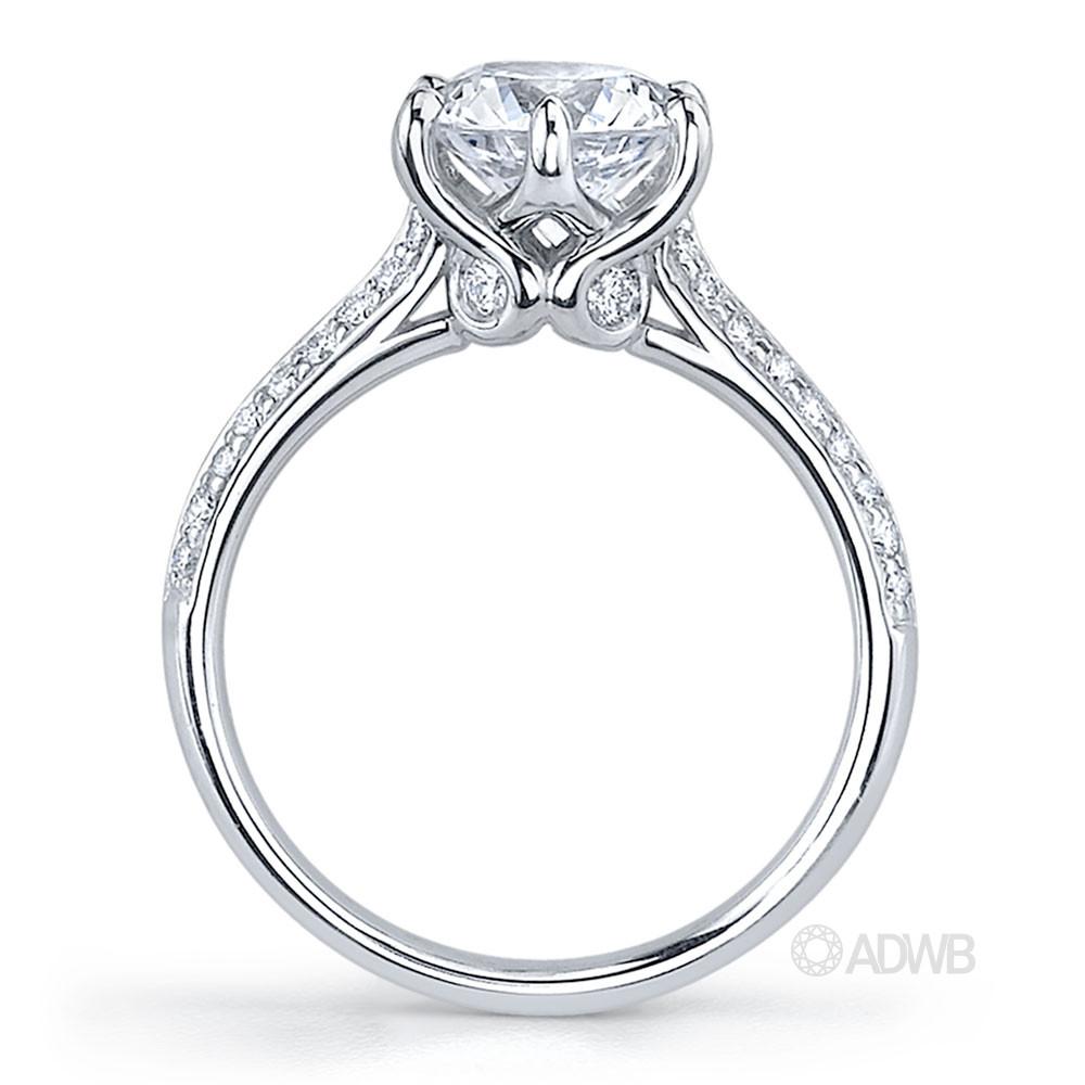 Elegant 6 claw round brilliant cut diamond solitaire ring with grain set diamond band