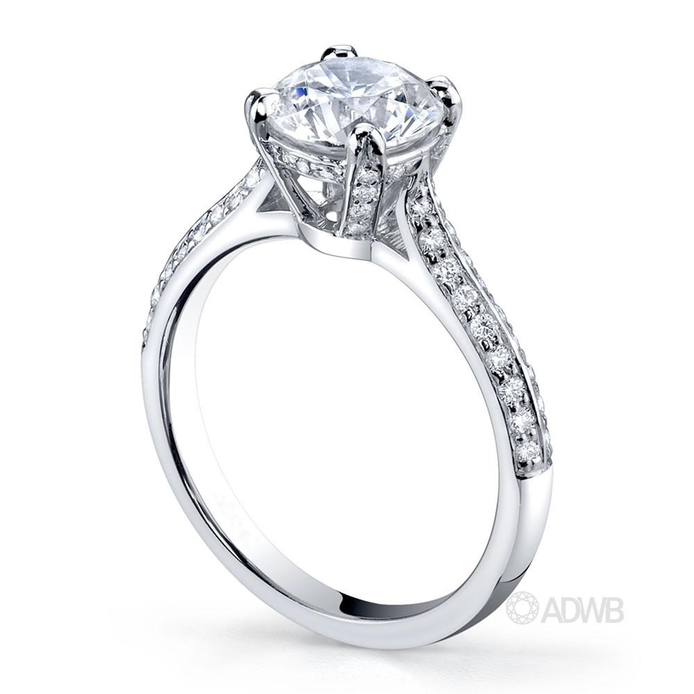 Harley 4 claw round brilliant cut diamond solitaire ring with grain set diamond knife edge band