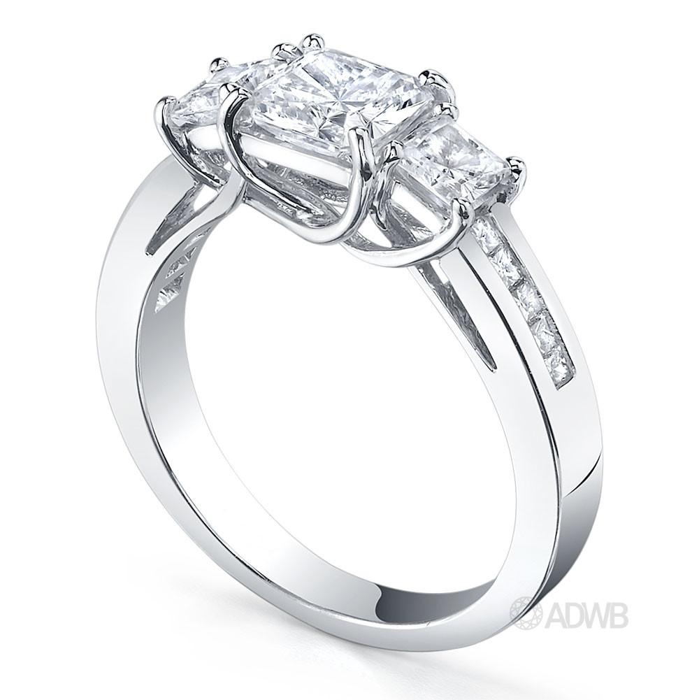 Classic 3 stone princess cut diamond ring with princess cut channel set band