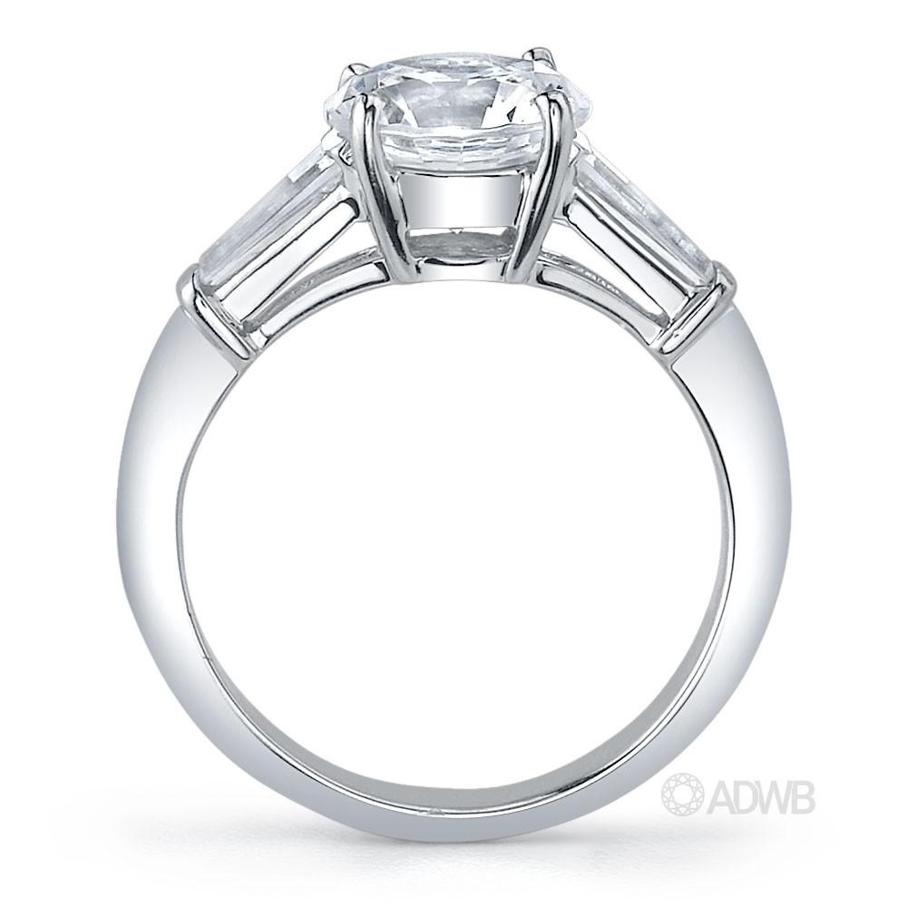 Round brilliant tapered baguette 3 stone diamond ring