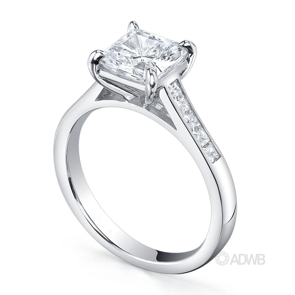 Classic Princess cut diamond ring with channel set diamond band
