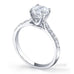Grace 4 claw round brilliant cut diamond solitaire ring with french pave set band