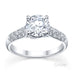 Star 4 claw round brilliant cut diamond solitaire ring with pave set band