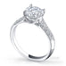 Star 4 claw round brilliant cut diamond solitaire ring with pave set band