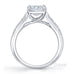 Cross claw solitaire princess cut diamond ring with tapered round brilliant cut diamond pave set band