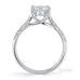 Royal crown round brilliant cut diamond ring with pave set band