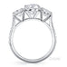 Classic 3 stone round brilliant cut diamond ring with micro pave set diamond band