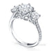 Elegant 3 stone round brilliant cut diamond ring with knife edge grain set diamond band