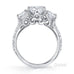Elegant 3 stone round brilliant cut diamond ring with knife edge grain set diamond band